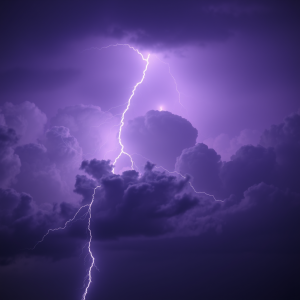 Lightning Bolt Frozen In Time Against Purple Storm Clouds