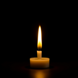 Single Candle Flame On Dark Background Peaceful