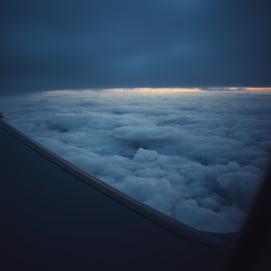 Airplane Wing View From Window Above Clouds Travel